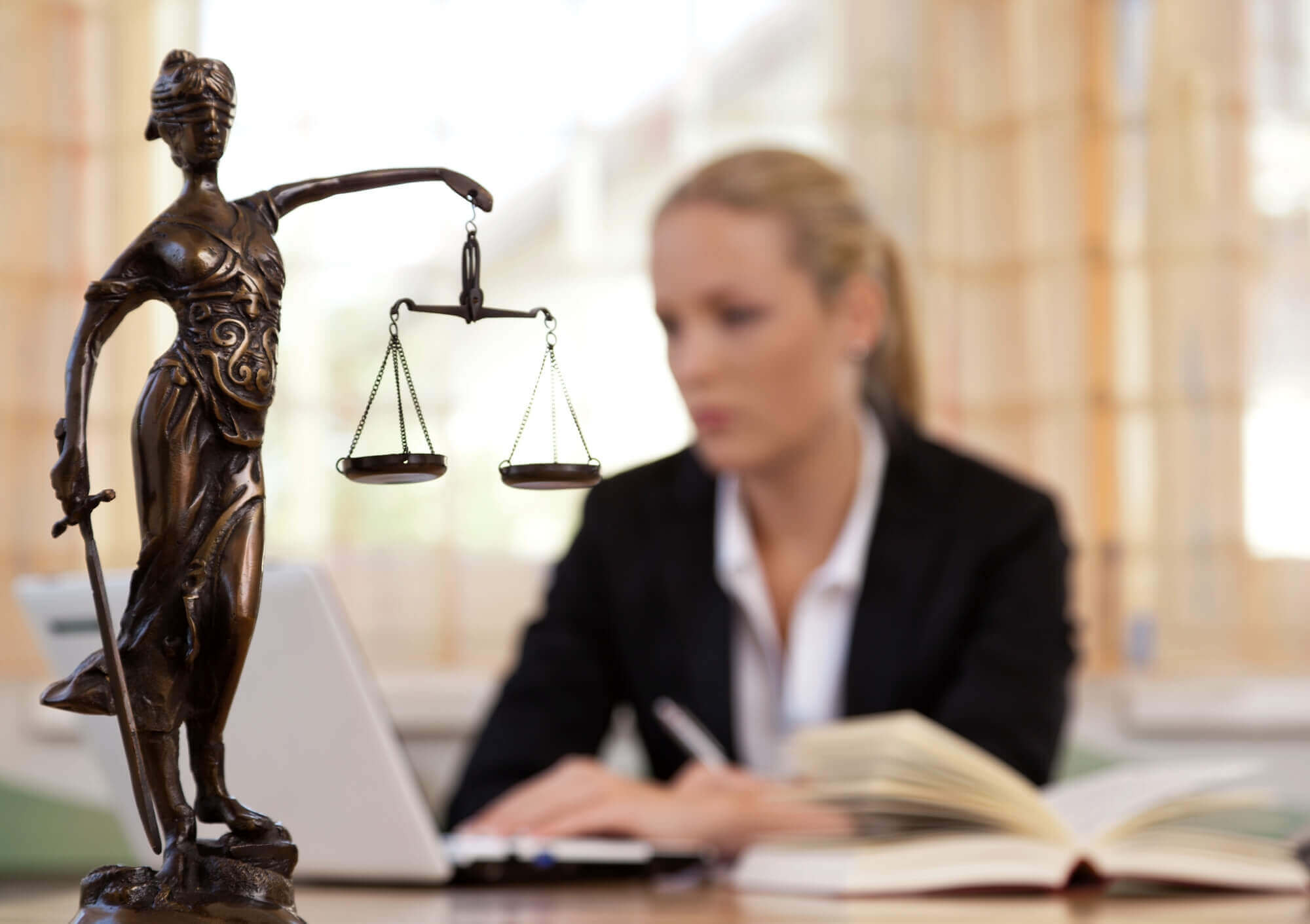 woman sitting in law office