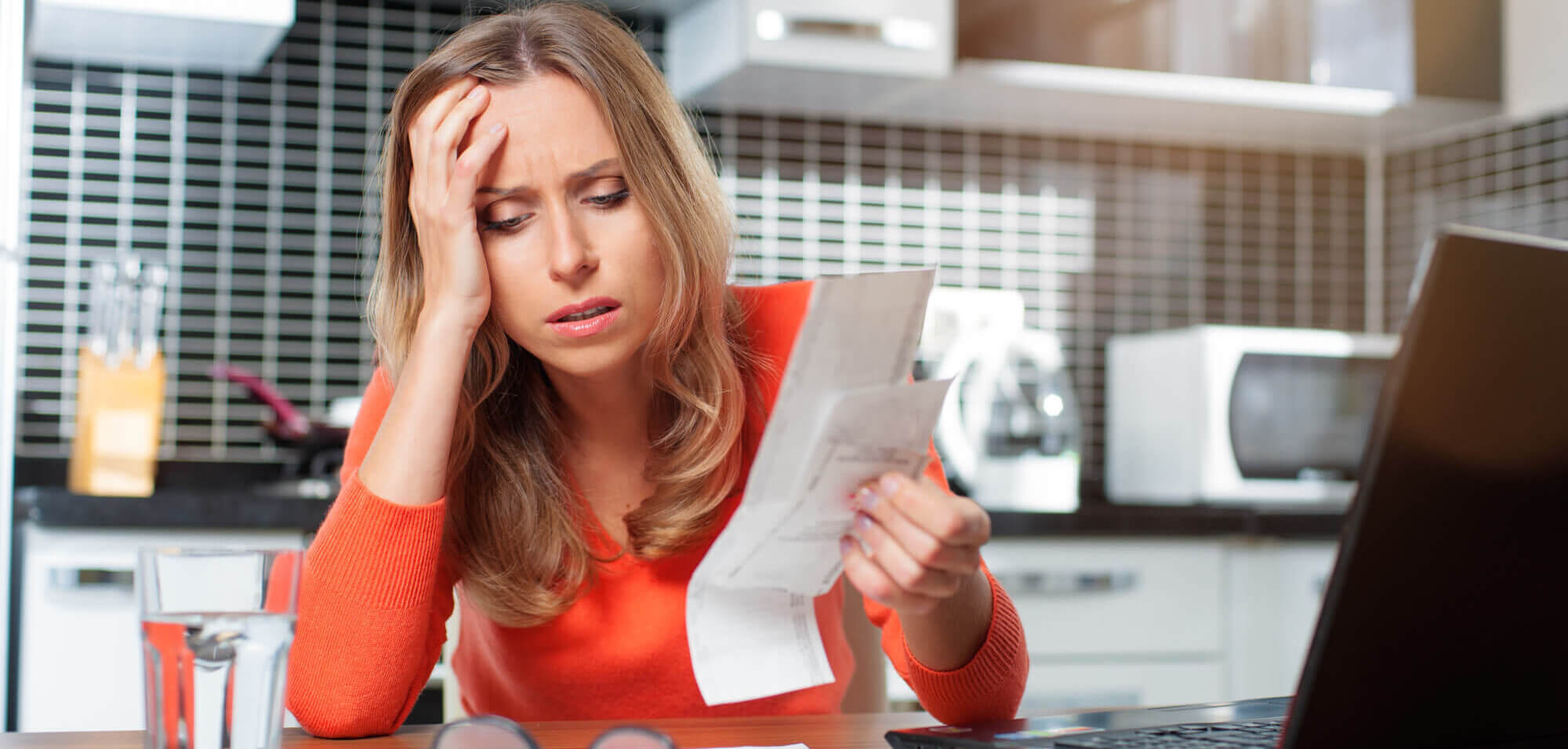 stressed woman considering bankruptcy